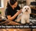 Professional groomer trimming a soft-haired Maltese with premium cordless dog clippers for delicate coats.